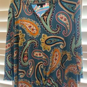 Beautiful paisley print top with front tie.  Comfortable and stylish.